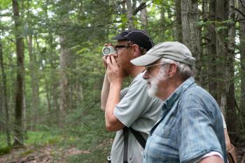 Syke van der Laan (left) with the ecologist Ted Elliman, during a BBG field study on natural plant communities in July in Sheffield, Mass.